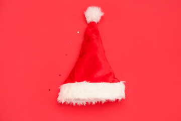 Santa Claus hat on red background