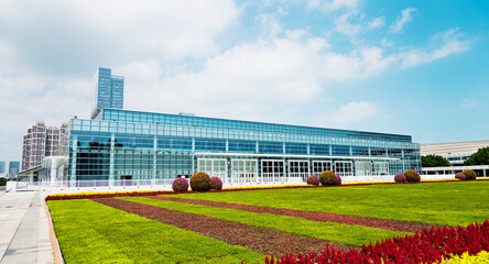Office building with glass facade and outside square