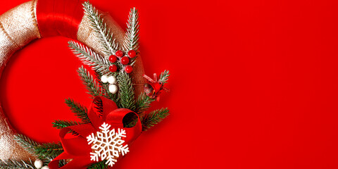 Christmas or New Year composition wreath of Xmas decorations and fir tree branches with copy space...