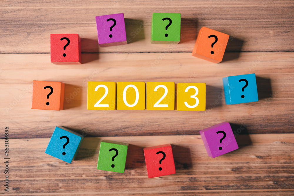 Aufkleber row of wood cube block with text 2023 for happy new year concept and wood cube question mark around