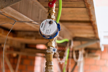 Water meter at a construction site. Provision and accounting of water at the construction site....
