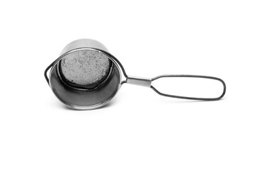 Old rustic hand tea strainer on isolated white background