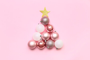Christmas tree made of beautiful balls on pink background
