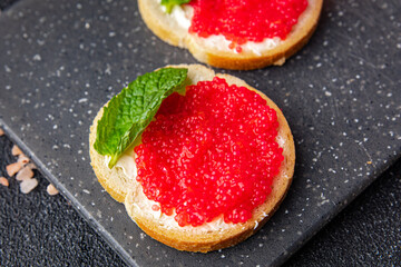 red caviar sandwich appetizer or antipasti seafood fresh healthy meal food snack on the table copy space food background rustic top view