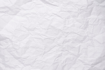White crumpled paper texture background, clean white wrinkled paper, top view.