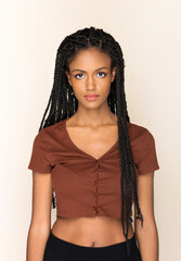 Confident African American female with Afro braids