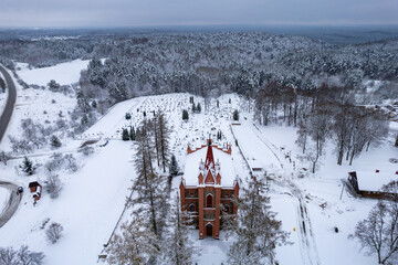 Aerial winter day snowy view of Dūkštos Church of St. Anne, Dūkštos, Lithuania
