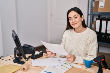 Young woman ecommerce business worker working at office