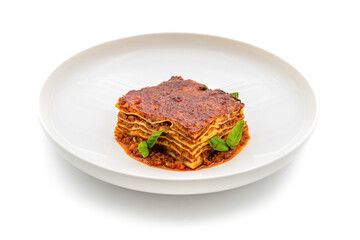 Bechamel sauce and minced meat lasagna on white background
