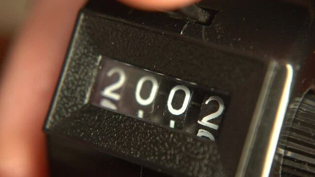 Number on a tally counter changing from 1999 to 2030