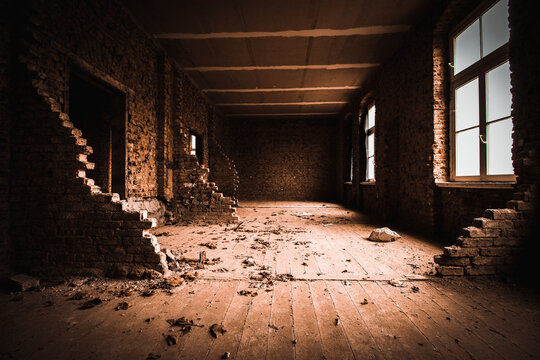 empty hall with broken stone walls