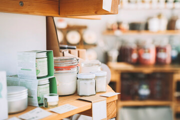 Beauty products jars on shelf in retail store