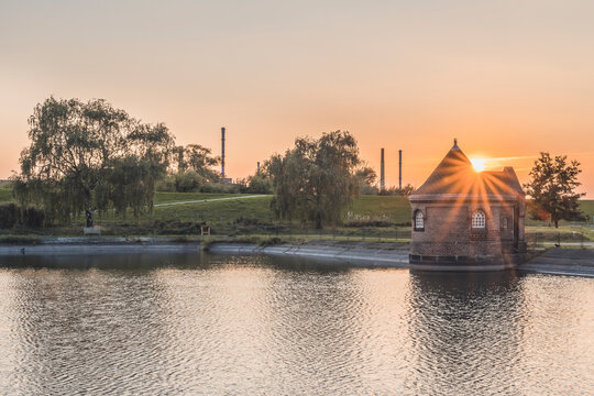 Germany, Hamburg, Historic filter house on Kaltehofe island at sunset