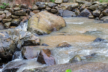 Mini waterfall in a small river