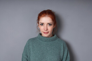 mid adult woman wearing turtleneck sweater