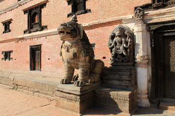 Decorations and statues at the entrance to a temple in Bhaktapur, Nepal.