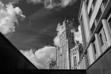 Stalin high-rise building on Sadovaya-Spasskaya street in Moscow. Stalinist architecture of the Soviet era. Stalinist Empire style. Bottom-up view. Black and white photo.