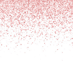 Rose gold falling glitter particles isolated