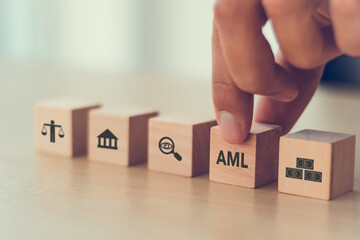 Anti Money Laundering (AML) regulations and compliance concept.  Turning to regulatory web data to...