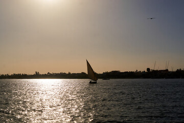 A boat on the Nile during sunset at Luxor, Egypt