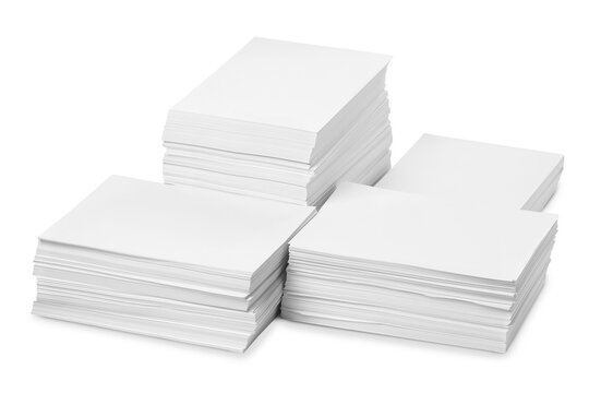 Stacks of paper sheets on white background