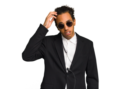 Young African American bodyguard man isolated being shocked, she has remembered important meeting.