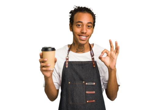 Young African American waiter man holding a takeaway coffee isolated cheerful and confident showing ok gesture.