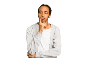 Young African American man isolated looking sideways with doubtful and skeptical expression.