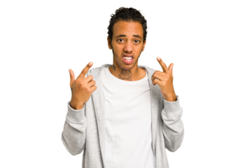 Young African American man isolated showing a disappointment gesture with forefinger.