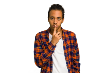 Young African American man isolated thinking and looking up, being reflective, contemplating, having a fantasy.