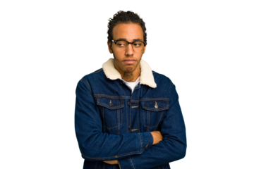 Young African American man isolated tired of a repetitive task.