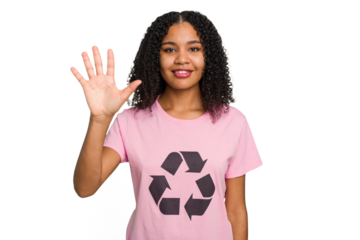 Young african american woman wearing a recycle t-shirt cutout isolated smiling cheerful showing number five with fingers.