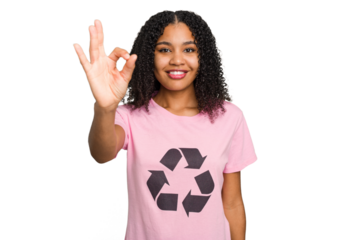 Young african american woman wearing a recycle t-shirt cutout isolated cheerful and confident showing ok gesture.