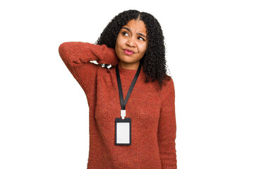 Young african american woman with ID card isolated touching back of head, thinking and making a...