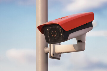 Security or speed camera on the sky background