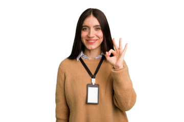 Young caucasian woman with ID card isolated cheerful and confident showing ok gesture.