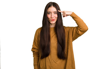 Young caucasian brunette long hair woman cutout isolated pointing temple with finger, thinking, focused on a task.