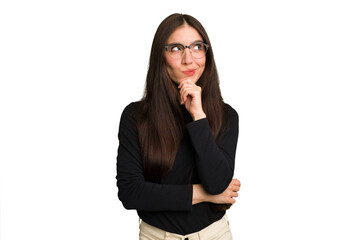 Young caucasian brunette long hair woman cutout isolated thinking and looking up, being reflective,...