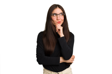 Young caucasian brunette long hair woman cutout isolated thinking and looking up, being reflective, contemplating, having a fantasy.