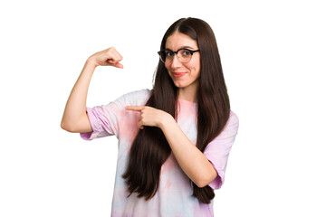 Young caucasian brunette long hair woman cutout isolated showing strength gesture with arms, symbol of feminine power