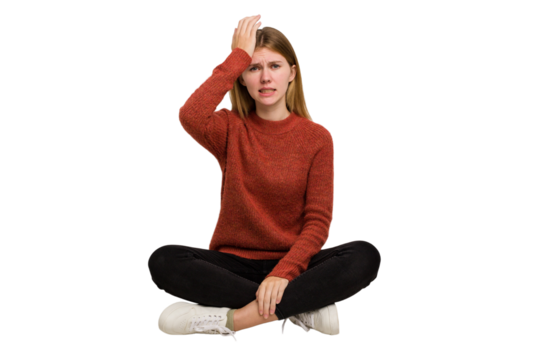 Young caucasian woman sitting on the floor cutout isolated - Powered by Adobe