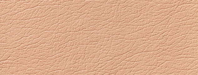 Light coral leather texture background with pattern, macro. Structure of natural beige textile backdrop, closeup.