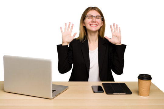 Young business caucasian woman working on her workplace cutout isolated showing number ten with hands.