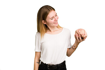 Young caucasian woman holding a brain isolated