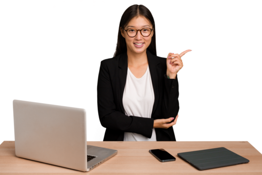 Young business asian woman sitting on a table isolated smiling cheerfully pointing with forefinger away. - Powered by Adobe