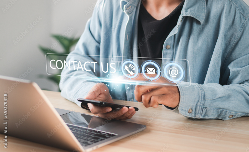 Poster businessman using laptop pc with contact icons on virtual interface. searching web, browsing informa