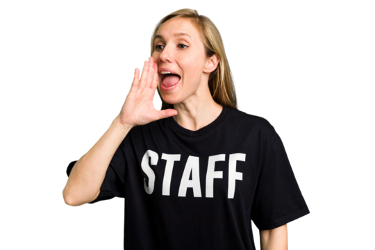 Young caucasian staff woman isolated shouting and holding palm near opened mouth.