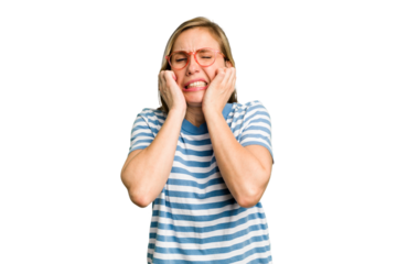 Young caucasian woman cutout isolated covering ears with hands.