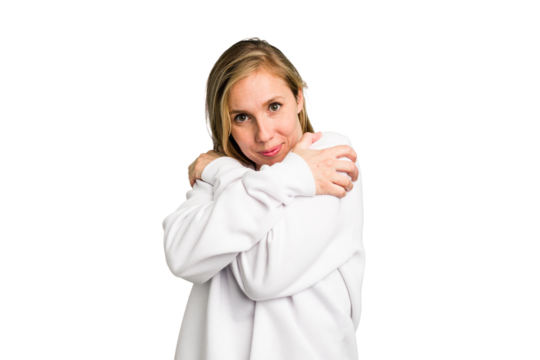 Young caucasian woman cutout isolated hugs, smiling carefree and happy.