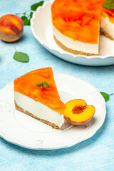 cheesecake with peache on a light background. Food recipe background. Close up